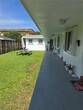 Foto principal - 411 SE 3rd Ave