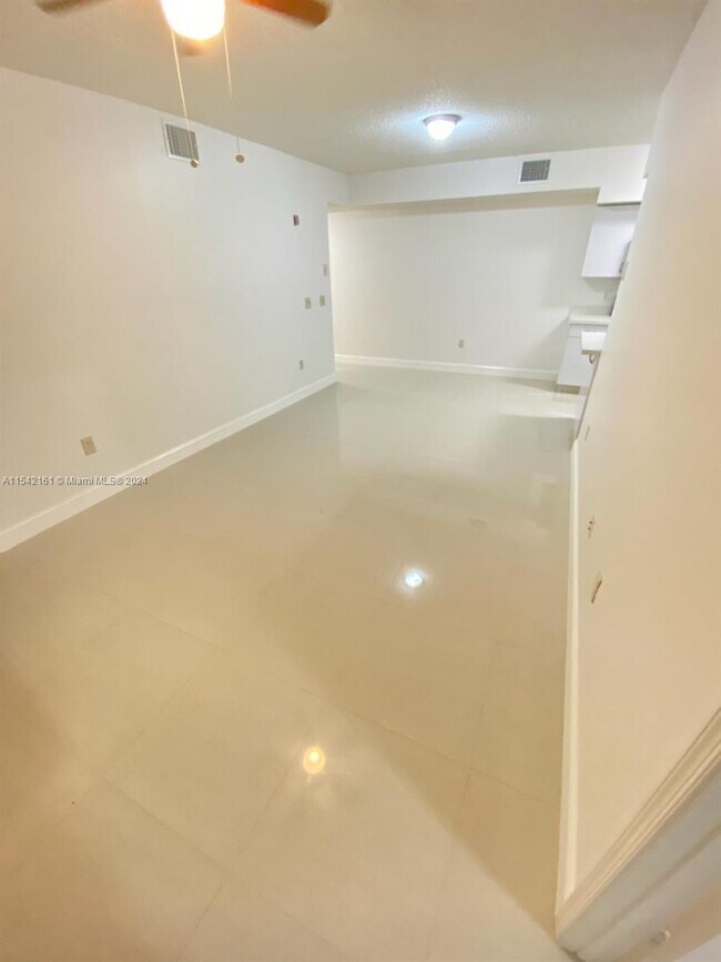 Building Photo - 3271 Sabal Palm Manor
