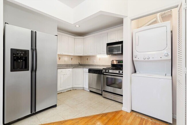 Kitchen with washer/dryer in unit - 529 W 147th St