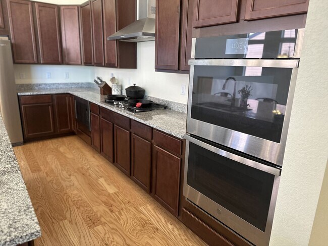 Building Photo - Modern 4-Bed Ranch in Erie with 13-Ft Ceil...