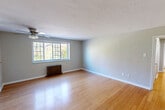 Located at 273 S Winebiddle St in Pittsburgh's Garfield neighborhood, this 2-bedroom, 1-bathroom residence offers a practical and well-organized single-floor layout. The open living area greets you with warm hardwood flooring, soft neutral-toned walls, and a ceiling fan overhead. A wide multi-pane window invites generous natural light and offers views of the surrounding greenery, while a classic cast-iron radiator adds a touch of architectural character.

The kitchen is efficiently designed, featuring warm wood cabinetry, granite-look countertops, a mosaic tile backsplash, and white appliances including a range and refrigerator. Tile flooring completes the space with easy maintenance in mind.

Both bedrooms are carpeted and finished with neutral tones, providing a calm and restful atmosphere. Each room benefits from natural light through double-hung windows, with cast-iron radiators present for consistent warmth. The primary bedroom is generously proportioned and includes closet access. The second bedroom also features a closet, making storage practical throughout.

The bathroom is clean and straightforward, featuring a tiled tub-shower combination with chrome fixtures and a vanity with ample counter space. Three closets throughout the unit provide excellent storage. The home's layout, light-filled rooms, and classic details make it a functional and comfortable Pittsburgh residence.