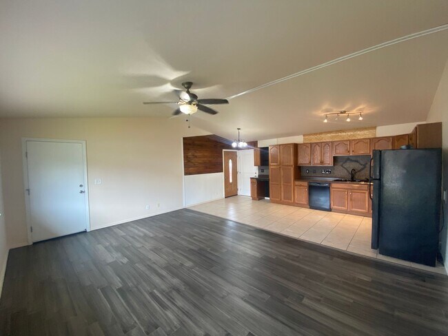 Building Photo - Spacious 3-Bedroom Home with Bonus Studio ...