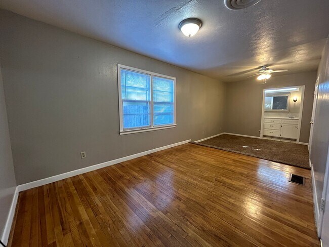 Building Photo - Spacious Home with Convenient Location and...