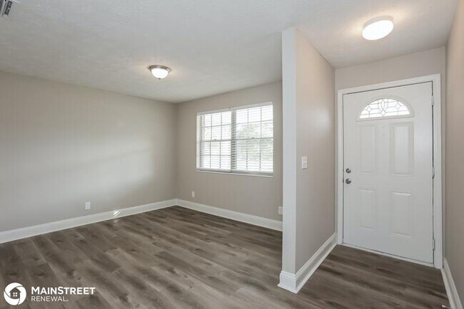 Building Photo - 7421 Deepwood Dr N