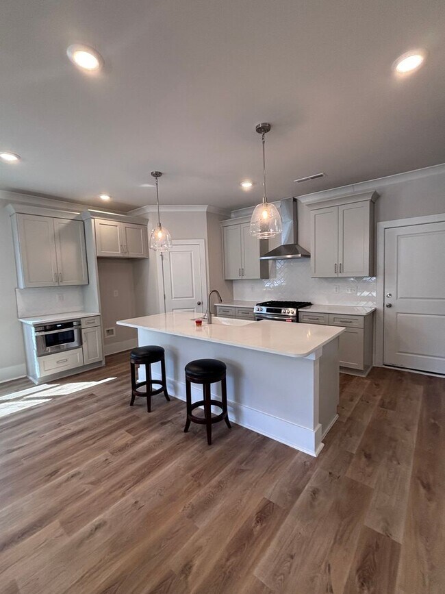 Building Photo - Brand new three-bedroom, 2.5-bath townhome