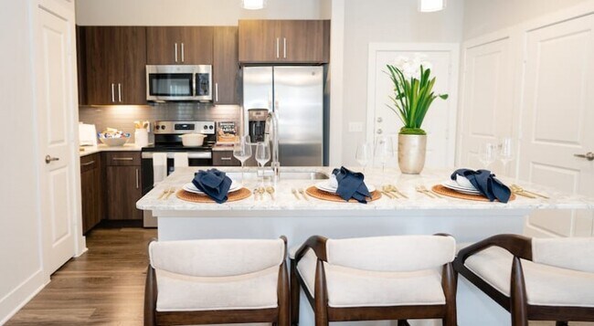 Building Photo - Tranquil Terrace 2BR: Your Private Outdoor...