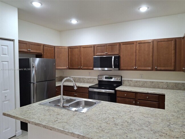 Building Photo - 9320 W 33rd Ln