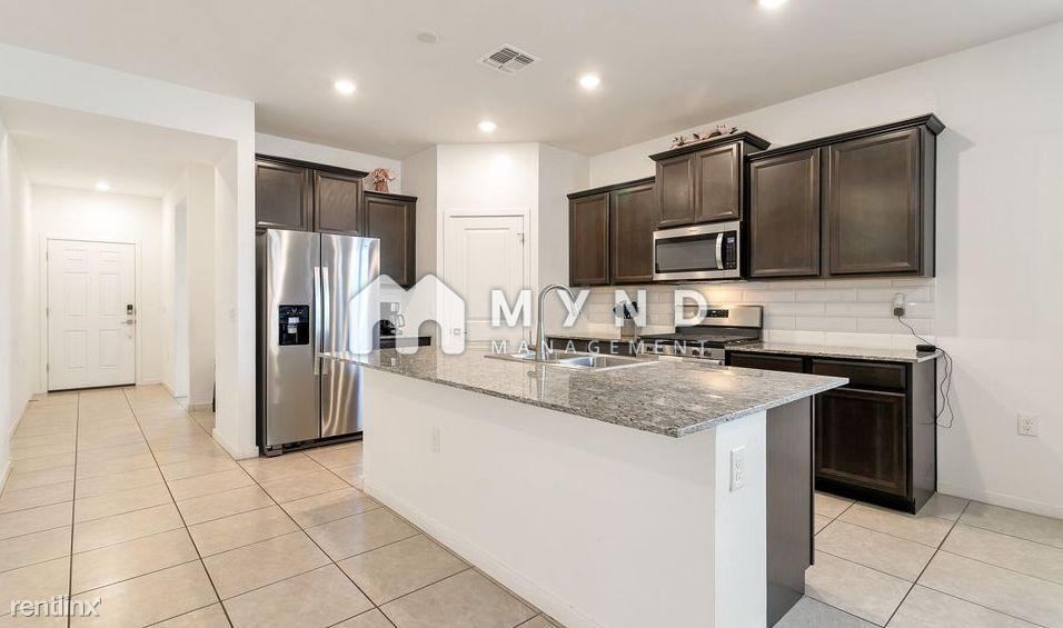 Building Photo - 4 br, 3 bath House - 14096 W Surrey Dr