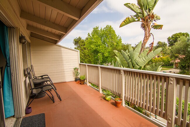 One of the two upstairs balconies offers sunset views and cool evening breezes. - 2838 Luciernaga St