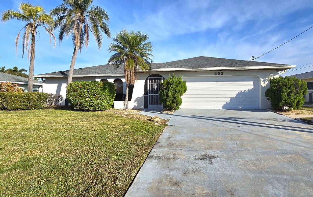 Photo - 403 SE 33rd Terr, Cape ~ Charming 3 bedroom Pool Home on Canal ~ FULLY FURNISHED - ANNUAL RENTAL ~ F