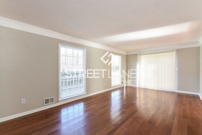 Building Photo - REDUCED!- Now offering $1000 off first ful...