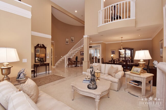 Building Photo - Massive 4 Bed 5 Bath Luxury Gated Residence Steps to Morgan Creek Golf Course