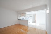 Located at 871 Avenue Rd in Toronto's desirable Forest Hill neighbourhood, this one-bedroom, one-bathroom unit offers a practical and well-laid-out single-floor plan. Warm hardwood flooring flows throughout the main living areas, lending the space a classic, inviting feel.

The open living and dining area is bright and airy, featuring wall sconces and a large window that frames lush, tree-lined views — filling the space with natural light. The galley-style kitchen is efficiently designed, with white cabinetry, dark countertops, a peninsula with an integrated sink, tile flooring, and a window overlooking greenery. White appliances, including a refrigerator and electric range, complete the functional layout.

The bedroom is a comfortable, sun-filled retreat with gleaming hardwood floors, a large window offering pleasant outdoor views, and a double sliding-door closet providing ample storage. The bathroom features classic white square tile walls, a soaking tub, a pedestal sink, and a window for natural ventilation. The clean, neutral palette throughout creates a cohesive and move-in-ready atmosphere, well-suited for those seeking a practical home in a prime Toronto location.