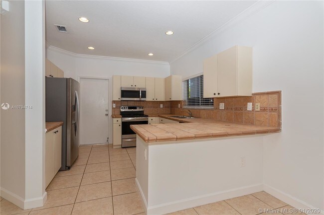Building Photo - 15888 SW 138th Terrace