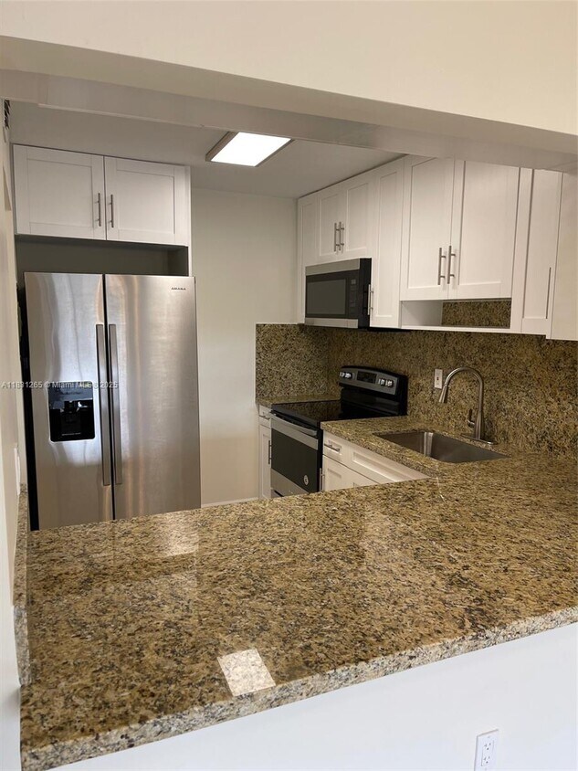 Foto principal - 6090 W 18th Ave