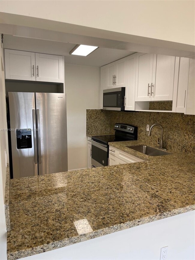 Photo - 6090 W 18th Ave Apartment