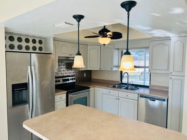 Building Photo - Available Now Welcome to this Annual 3 bed...