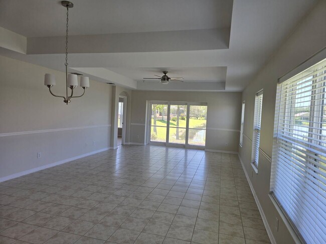 Building Photo - Stunning Lakefront Home with Magnificent Unobstructed Water View