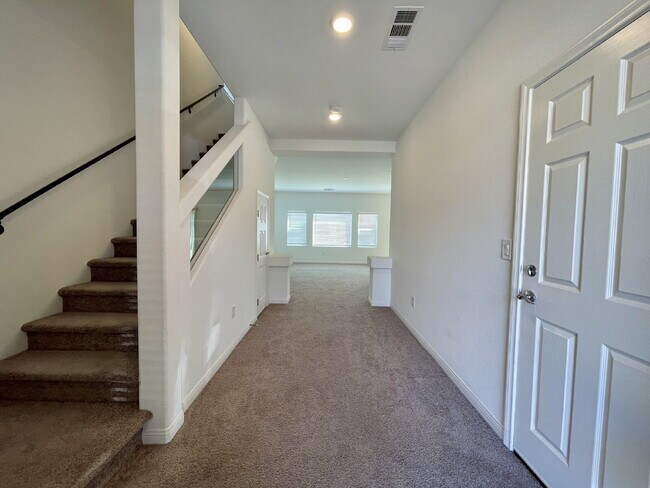 Building Photo - BEAUTIFUL 5 BED 3.5 BATH 3 FLOORS 2 CAR GARAGE SINGLE FAMILY HOME W/ LARGE LOFT & BACKYARD FOR RENT!