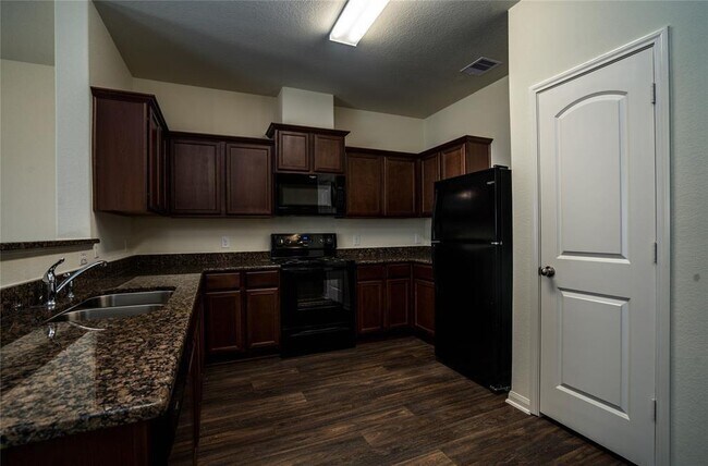 Foto del edificio - 208 Autumn Berry Ln