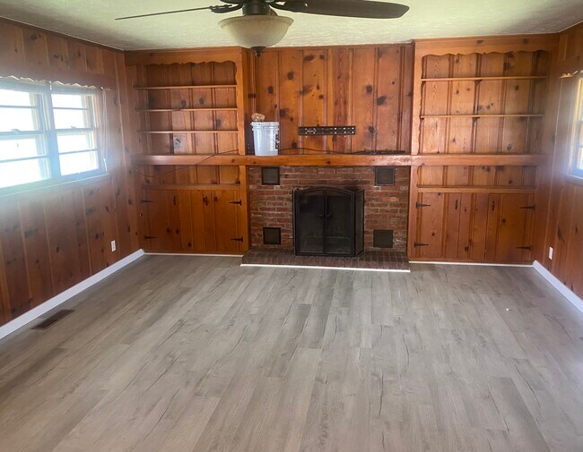 Den with fireplace - 212 14th Ave NE