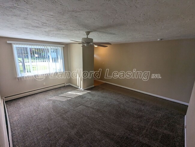 Building Photo - Beautifully Maintained Brick Duplex