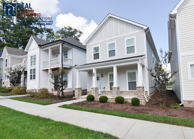Foto del edificio - Beautiful, modern 4 bdrm home with attache...