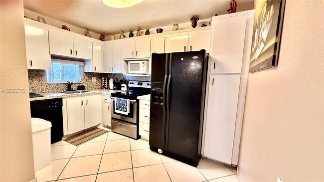 Foto del edificio - 8961 S Hollybrook Blvd