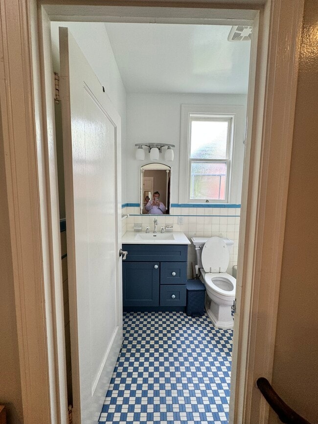 Remodeled bath kept the original period tile & upgraded the rest - 50 Balmy St