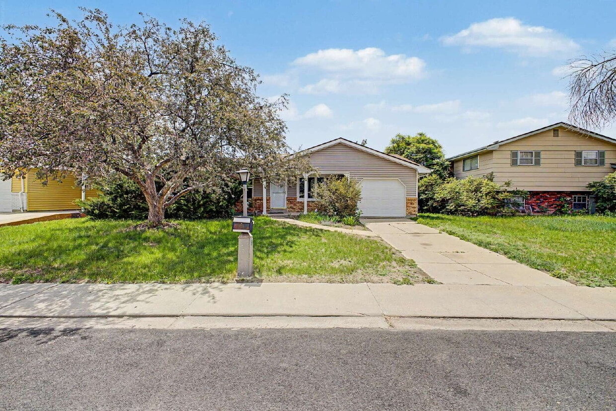 Photo - "Spacious 4-Bedroom Gem in Longmont with 2 Full Bathrooms - Your Perfect Home Awaits at 2519 Danbury