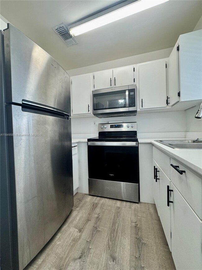 Building Photo - 5889 W 26th Ave