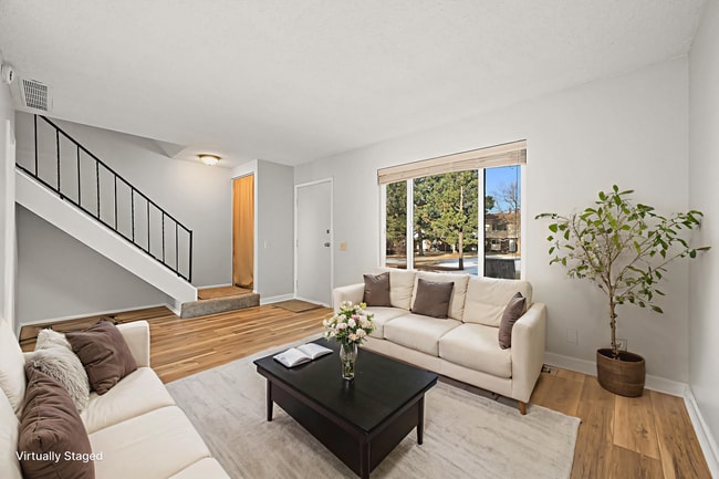 Photo - 3BR Townhome in Aurora | Private Yard, Covered Parking & Community Pool