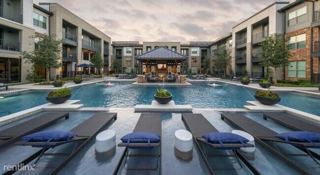 Foto del edificio - Studio, 1 bath Condo - 11175 W Airport Blv...