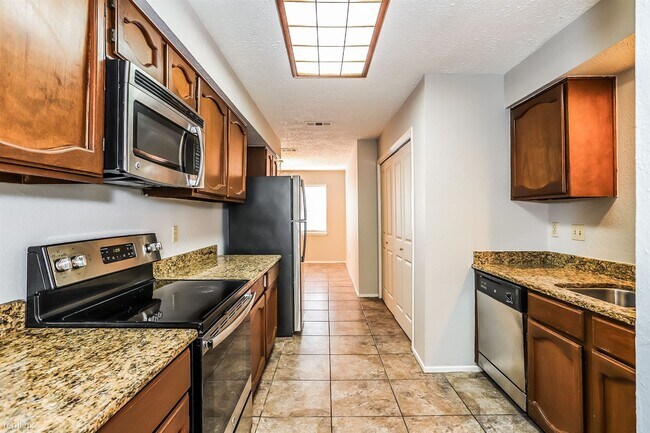 Building Photo - 3 br, 2 bath House - 14214 Bateau Dr