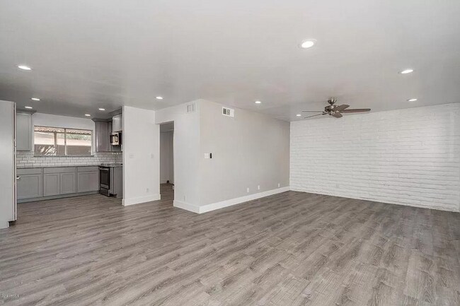Living room from front door - 3635 E Turney Ave