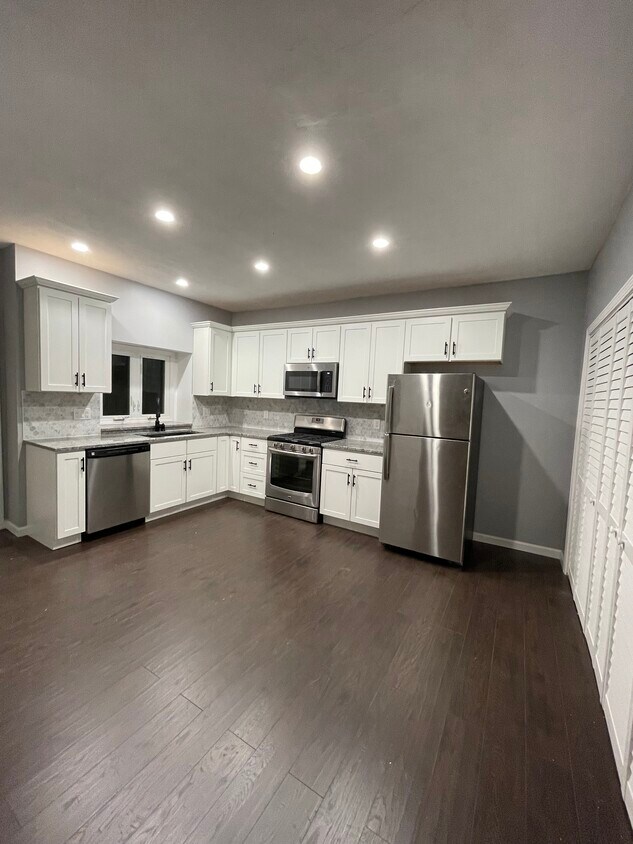 Brand new granite counter tops, sink, & wood cabinets - 40 John St