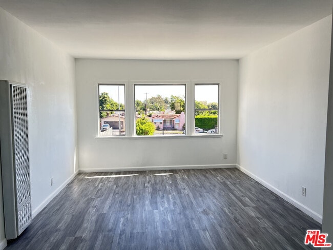 Building Photo - 6031 8th Ave