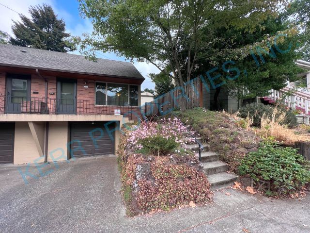 Building Photo - Charming 2-Bed Oasis with 1,111 Sq Ft of C...