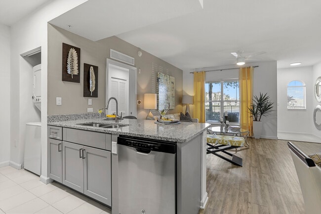 Renovated I Living and dining areas with hard-surface vinyl plank flooring - Avalon Coconut Creek