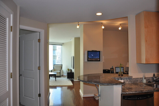 Kitchen, Office to the right & Bedroom, Bath, Laundry to the left, Living Rm center - 3338 Peachtree Rd NE