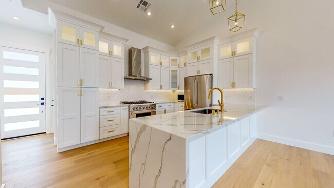 Building Photo - Better Invested Presents This Stunning Mar...