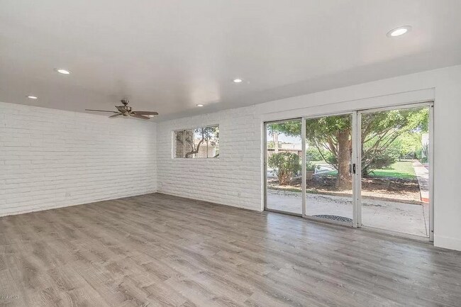 Living room from kitchen - 3635 E Turney Ave