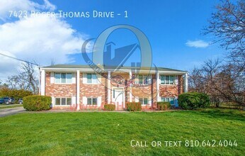 Building Photo - 7423 Roger Thomas Dr