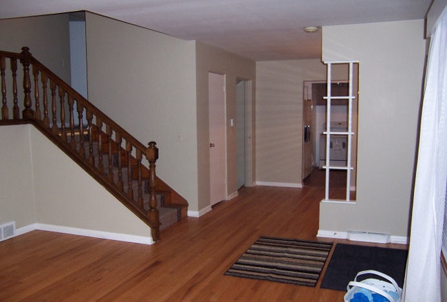 Livingroom to upstairs - 125 S Adams St