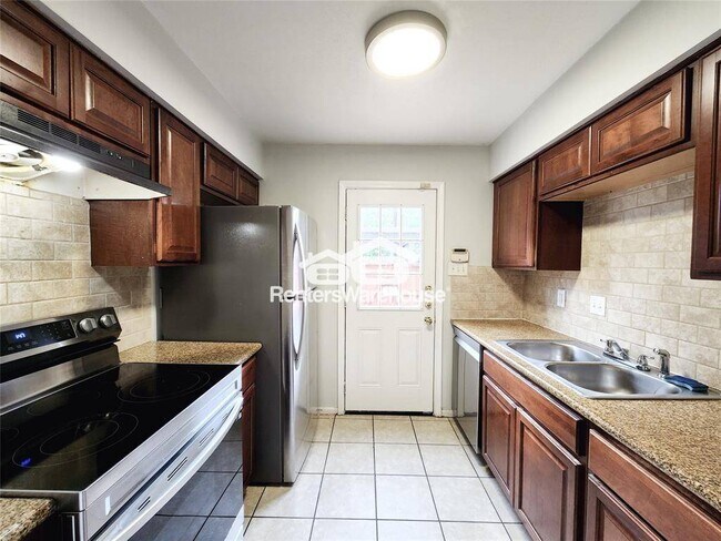 Foto del edificio - 8848 Kempwood Dr