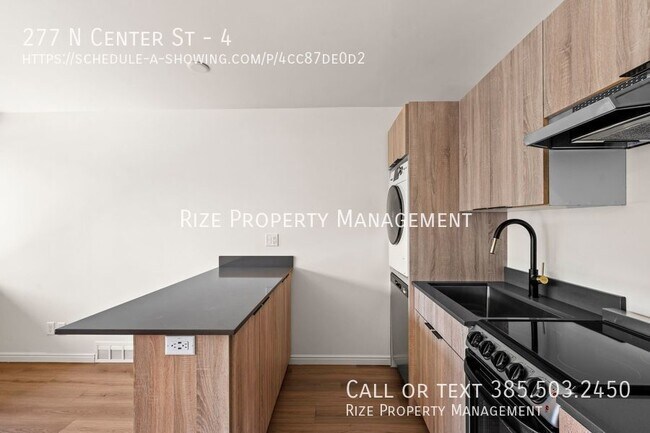 Building Photo - Live at the Center of Modern Conveniences ...