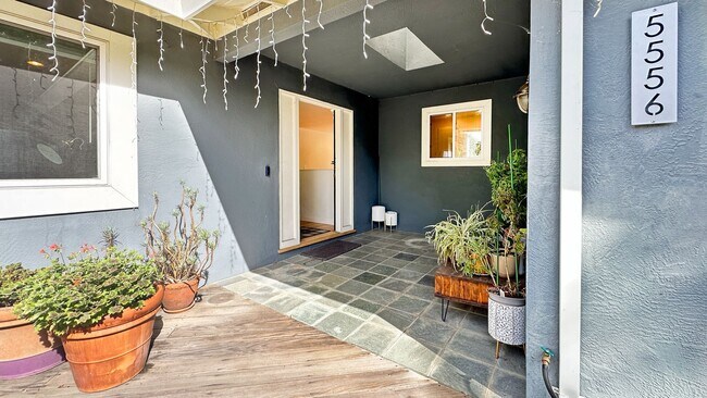 Building Photo - Light-Filled Home with Beautiful Garden & 2-Car Garage