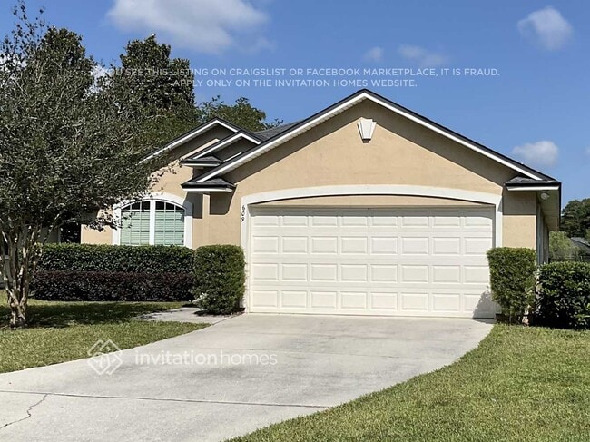 Building Photo - 609 Racoon Ct