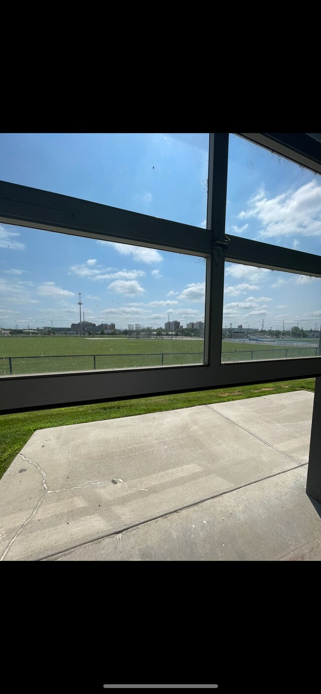 Overhead opens up from the patio to have additional outdoor space overlooking the ISU track - 1 Sycamore St