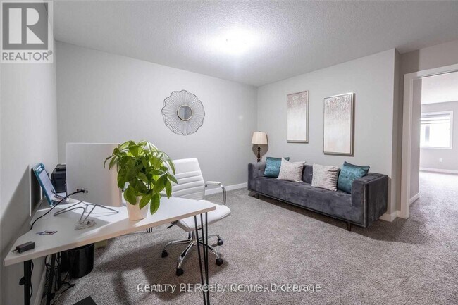 Photo du bâtiment - 915 Robert Ferrie Dr